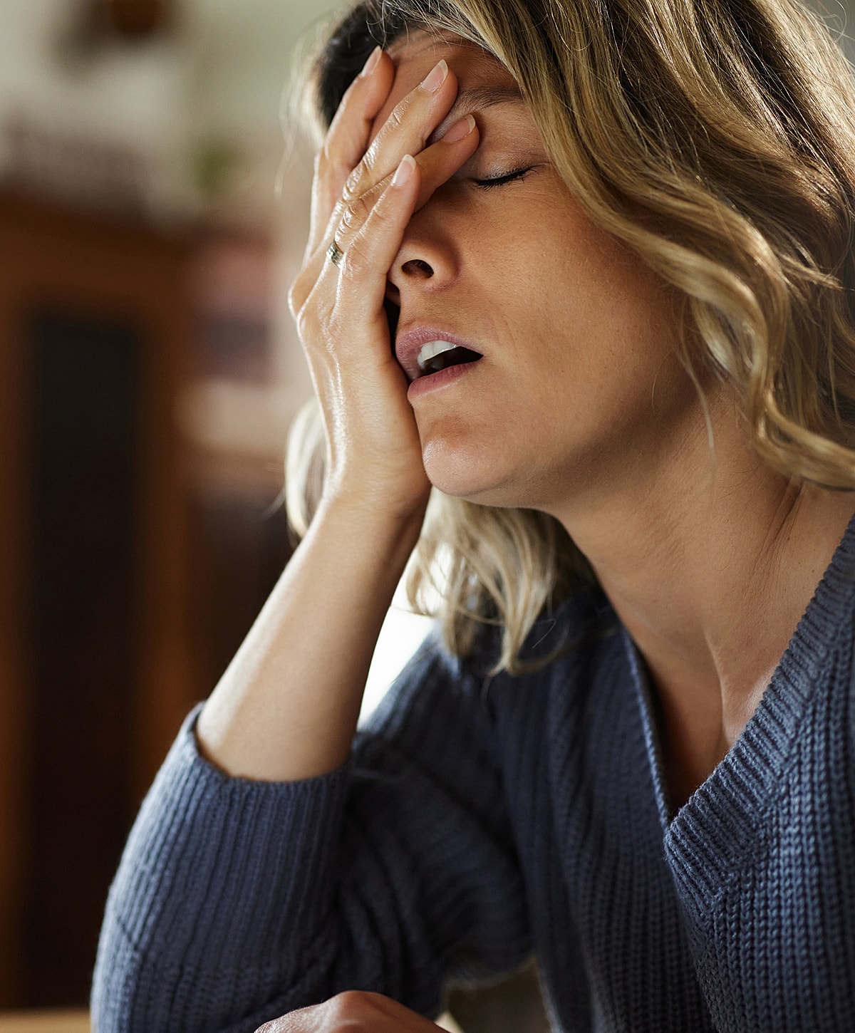 Torrance Chronic Fatigue Syndrome Treatment woman expressing frustration in natural setting.