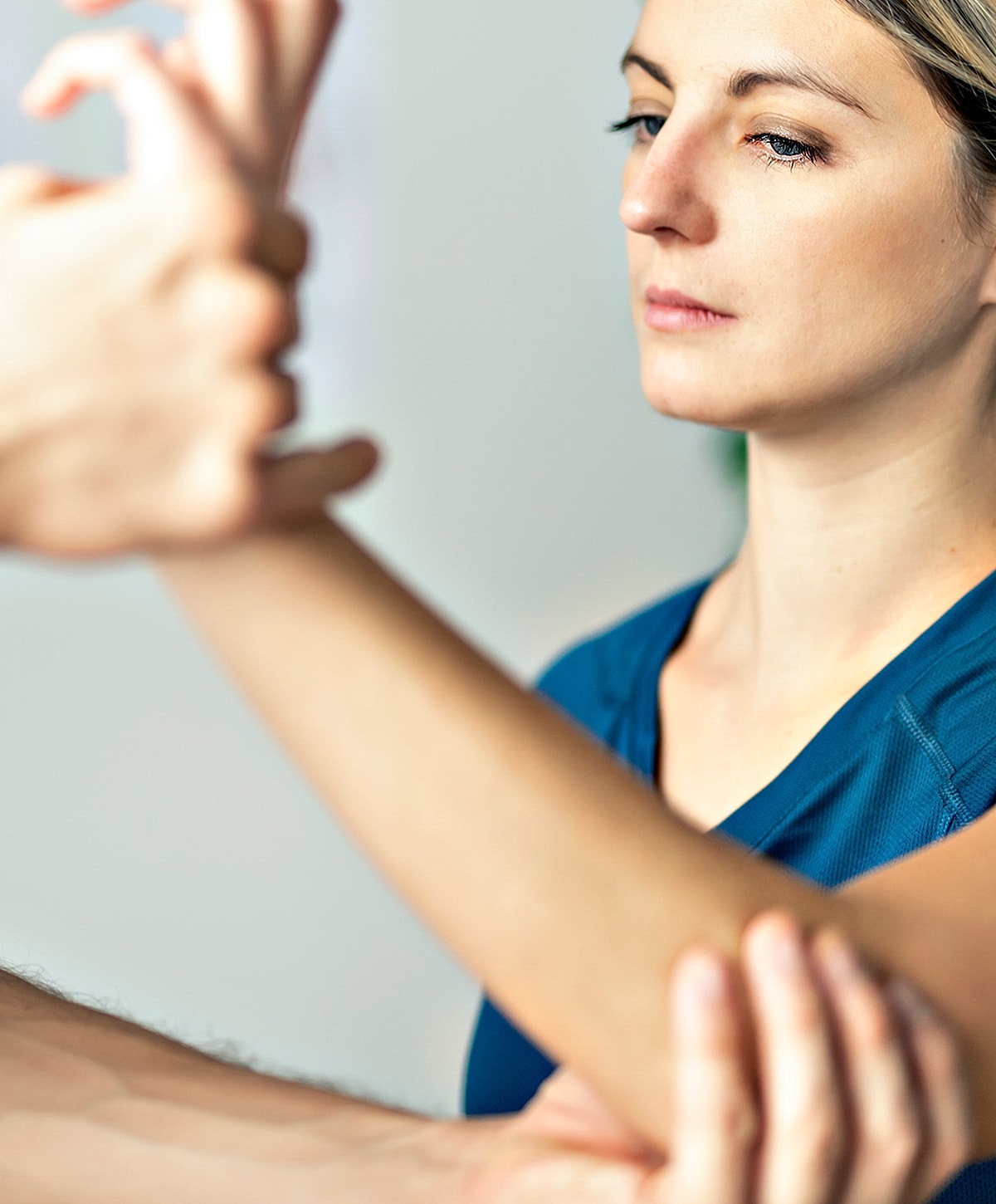Torrance hEDS treatment person receiving therapy or guidance on arm position.